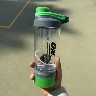 شیکر ورزشی درپیچی Optimum Nutrition با توپی فنری و درب پیچی رنگی - تصویر 6